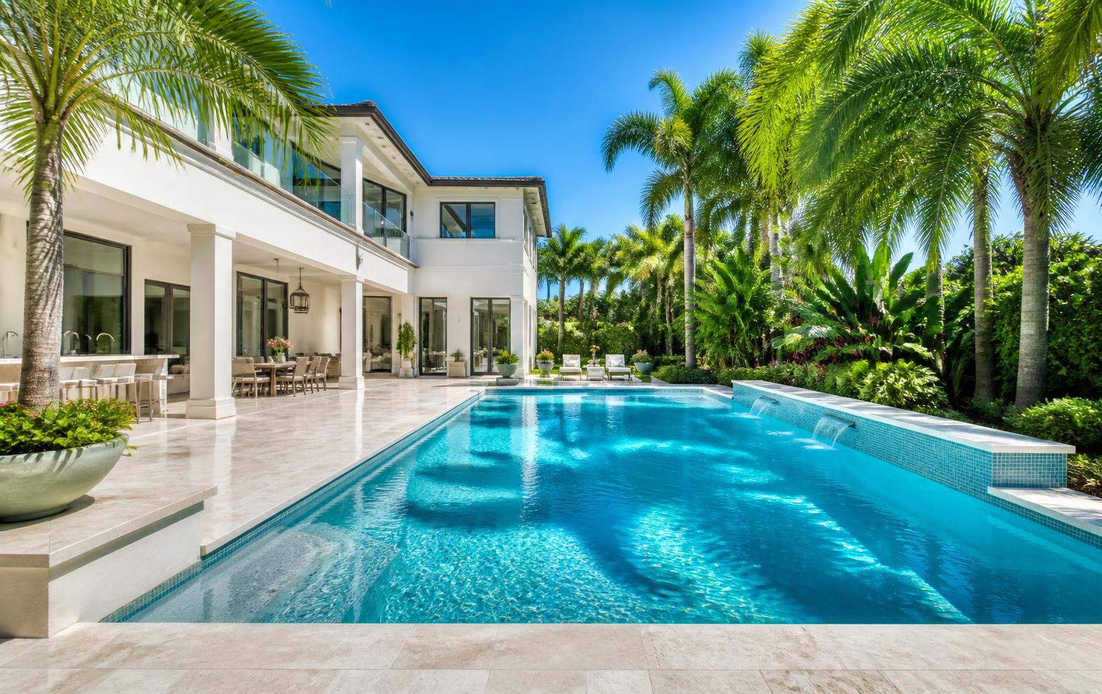 Clean residential swimming pool and patio at a South Florida home